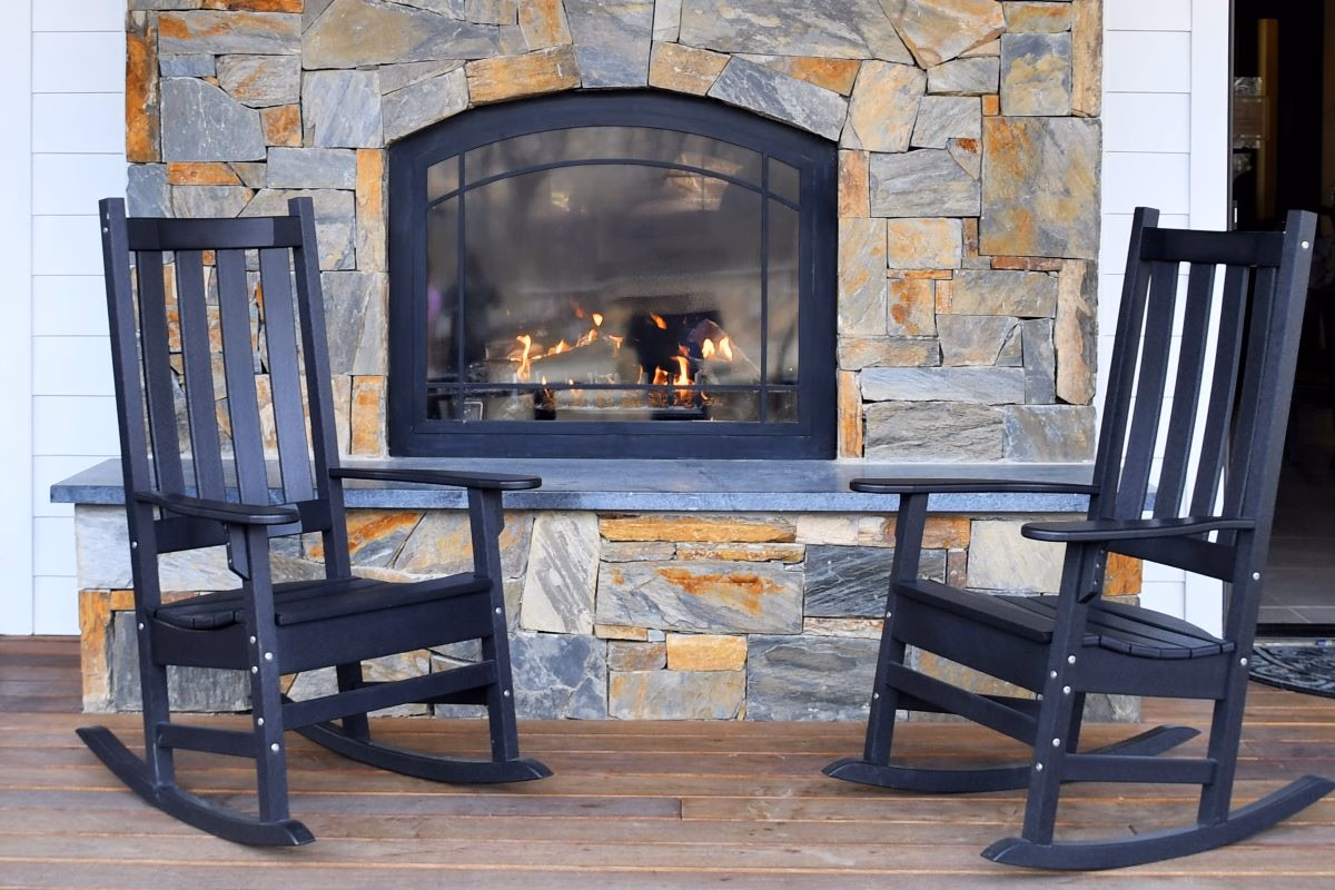 empty-rocking-chairs-near-fireplace-inside-home-2026-01-09-00-37-05